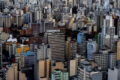 High angle view of modern buildings in city