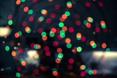 Defocused image of illuminated lights at night