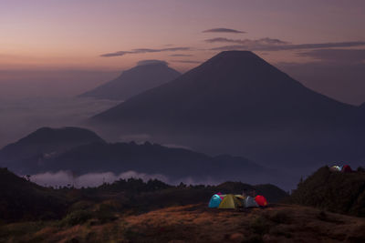 Scenic view of mountains against sky during sunset