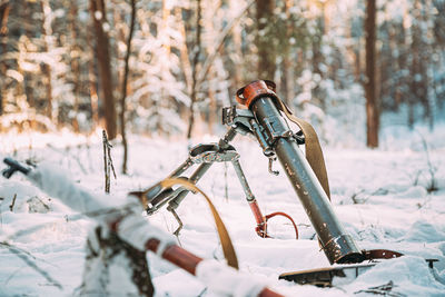 Bicycle on snow covered field