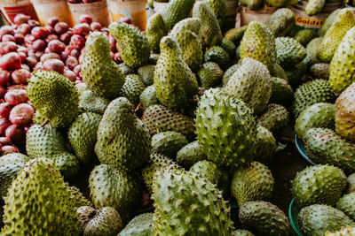 A group of soursop fruits on street market