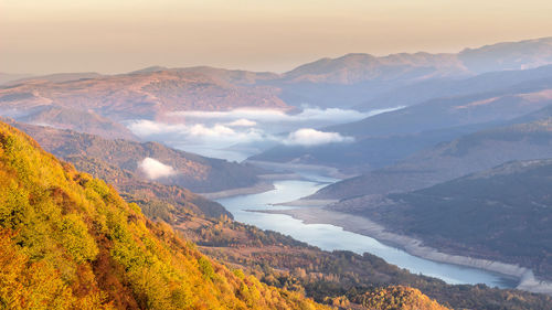 Scenic view of mountains against sky during sunset