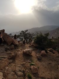 Rock formations on landscape against sky