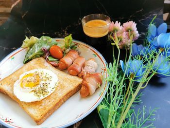 Close-up of breakfast served on table