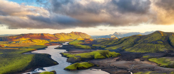 Scenic view of landscape against sky during sunset