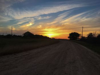 Road against sky during sunset