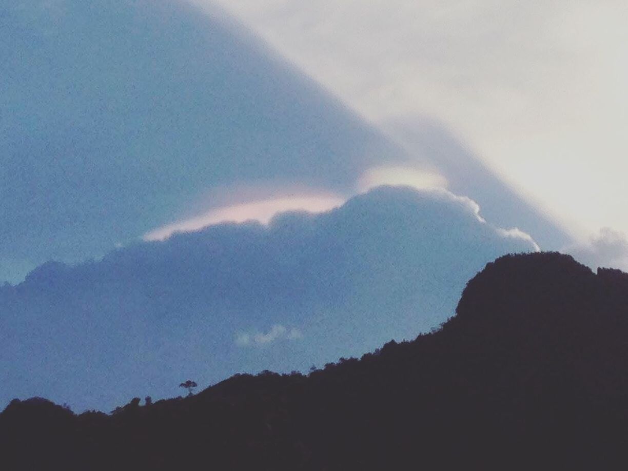 LOW ANGLE VIEW OF MOUNTAINS AGAINST SKY