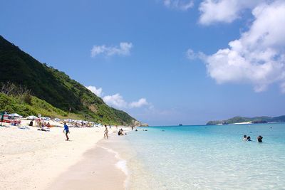 Tourists enjoying at beach