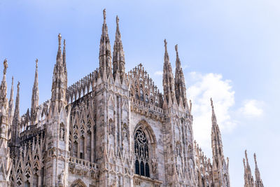 Close up image of the duomo di milano cathedral's front facade.