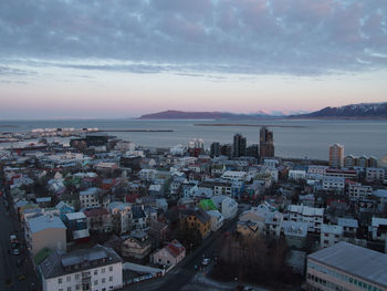 High angle shot of cityscape at sunset