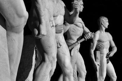 Close-up of male statue at stadio dei marmi. rome