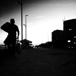 Woman walking on city street