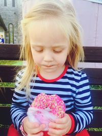 Cute girl holding ice cream