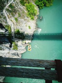 High angle view of rocks by sea