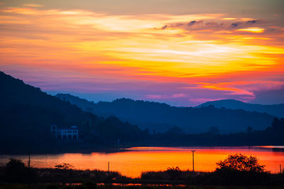 Scenic view of dramatic sky during sunset