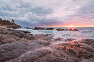 Scenic view of sea against sky during sunset