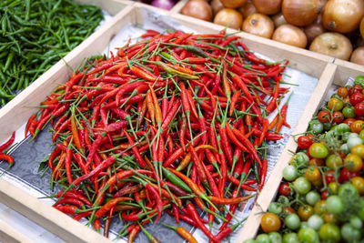 High angle view of red chili peppers for sale at market