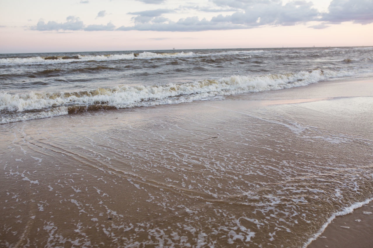 VIEW OF BEACH AGAINST SKY