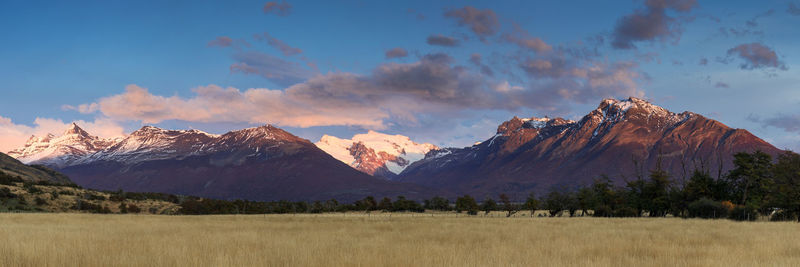 Panoramic view of landscape and mountains against sky