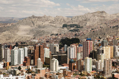 Aerial view of cityscape against sky