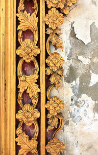 Close-up of ornate door on wall