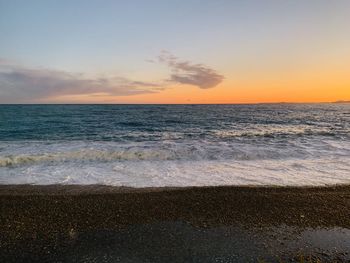 Scenic view of sea against sky during sunset