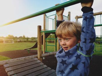 Cute boy in playground at park