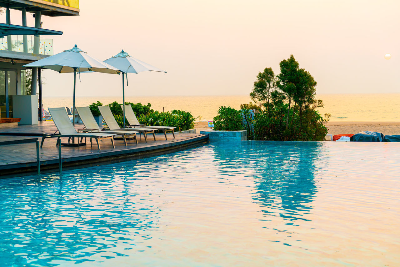 SWIMMING POOL BY SEA AGAINST SKY