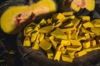 High angle view of pumpkin slices on table