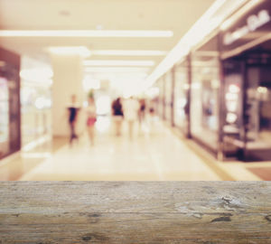 Defocused image of people walking on building