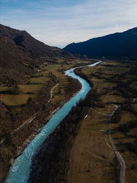 High angle view of landscape with river against sky