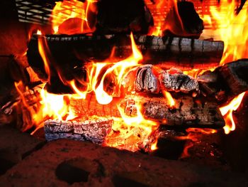 Close-up of fire burning at night