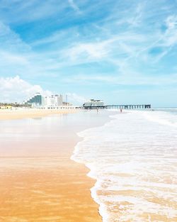 Scenic view of beach against sky