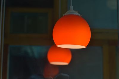 Close-up of illuminated pendant lights