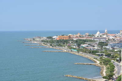 Scenic view of sea against clear blue sky
