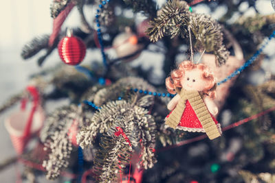 Close-up of christmas decoration hanging on tree