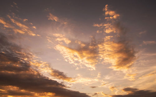 Low angle view of dramatic sky during sunset