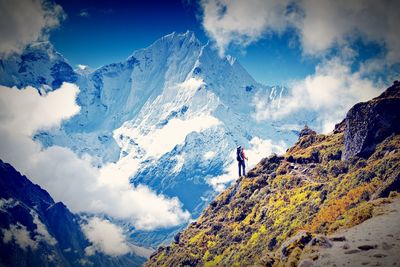 Panoramic view of snowcapped mountains against sky