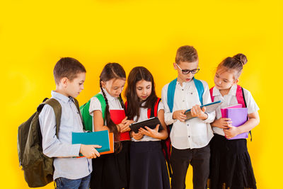 Group of people holding smart phone