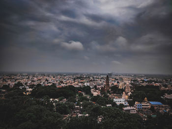 High angle view of buildings in city against sky