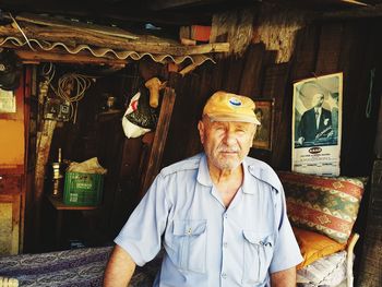 Portrait of man standing in store