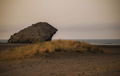 Scenic view of monsul beach in cabo de gata nature park, almeria, spain, against sky during sunrise