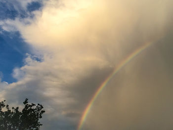 Low angle view of rainbow against sky