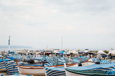 Boats moored at harbor
