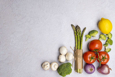 Directly above shot of fruits against white background