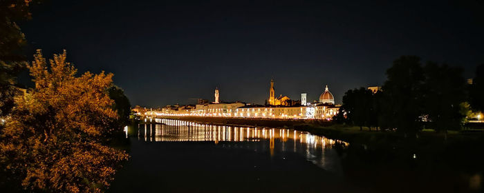 Illuminated building of florence against sky at night