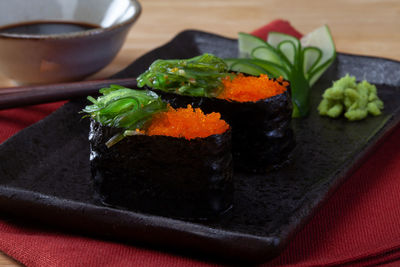 Close-up of sushi served on table