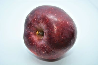 Close-up of apple against white background