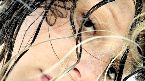 Close-up portrait of girl with wet hair