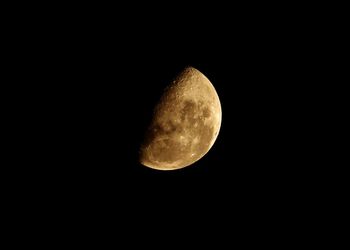 Scenic view of moon against sky at night